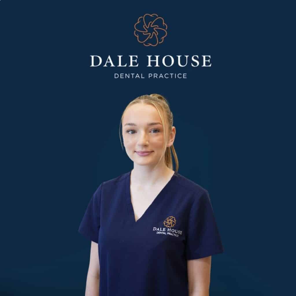 Dale House Dental Practice staff member in navy scrubs